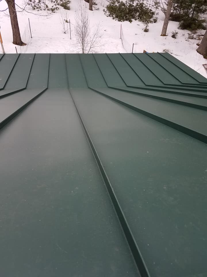 Close up green seam metal roofing